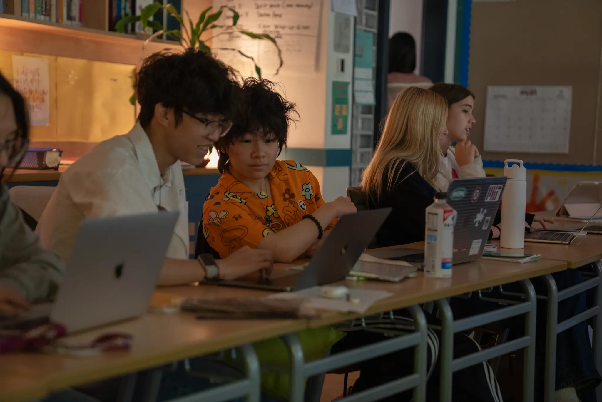 Students working together in a class